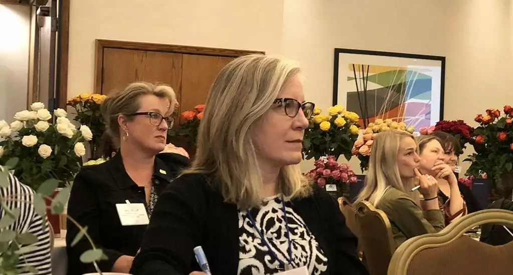 Sarah Donnelly of Donnelly Floral & Event Design in Rio Visto, California, takes notes during an educational session at SAF’s 1-Day Profit Blast in Portland. She was among 108 industry members at the event.