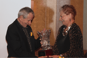 Michigan Floral Foundation Chair Alice Waters, AIFD, CF, PFCI presents the 2015 Hall of Fame award to Mr. Robert “Bob” Friese, AIFD.