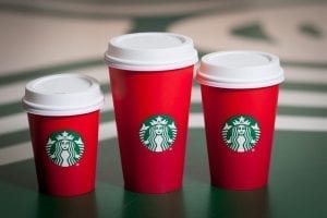 Starbucks has encountered both critics and supporters over its decision to release a spare, red holiday cup this year. Past designs have featured Christmas or wintery-themed designs. 