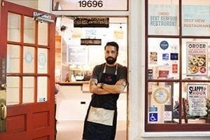 Andrew Gruel, chef and owner of the Slapfish restaurant chain, responds to about 50 online reviews a day, positive or negative. Credit Emily Berl for The New York Times
