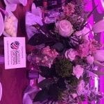 The luncheon bouquets and centerpieces featured beautiful American grown roses, peonies, stock, tulips, lilies, protea, Bells of Ireland, alstromeria, bupleurum, dianthus, freesia, lisianthus, ranunculus, viburnum, waxflower, ferns, leatherleaf and curly willow.