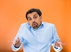 stock image of a guy looking like 'I didn't do it' expression on his face