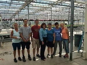 Rep. Annie Kuster (D-N.H.), center, visited D.S. Cole Growers in Loudon, New Hampshire, earlier this month. “She did a good job of  me that she had many of our interests in mind, such as immigration reform,” said Doug Cole (in red T-shirt). 