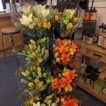 The addition of $25 cash and carry bouquets and a line of mugs and spa items have bumped up sales between peak holidays at Allan's Flowers in Prescott, Arizona.