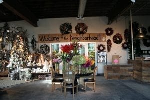 McNamara Florist is using furniture, props and color to slow customers down so they linger longer.