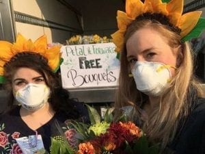 Alyssa Devincenzi, assistant store manager, and Tegan Davidson, buyer and quality assurance coordinator, of Sequoia Floral International in Santa Rosa, California, went ahead with plans to Petal It Forward last week despite waking up to “the most devastating fire storm,” days before the event, according to Davidson.