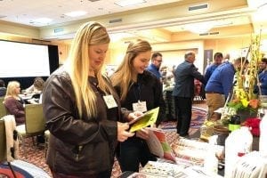 Profit Blast participants Lacey Schoenbeck and Daisy West, both of Lily’s Flowers & Gifts in Fairbury, Nebraska, check out the Supplier Expo. The two were among 121 floral industry members to attend the event last weekend in Omaha.