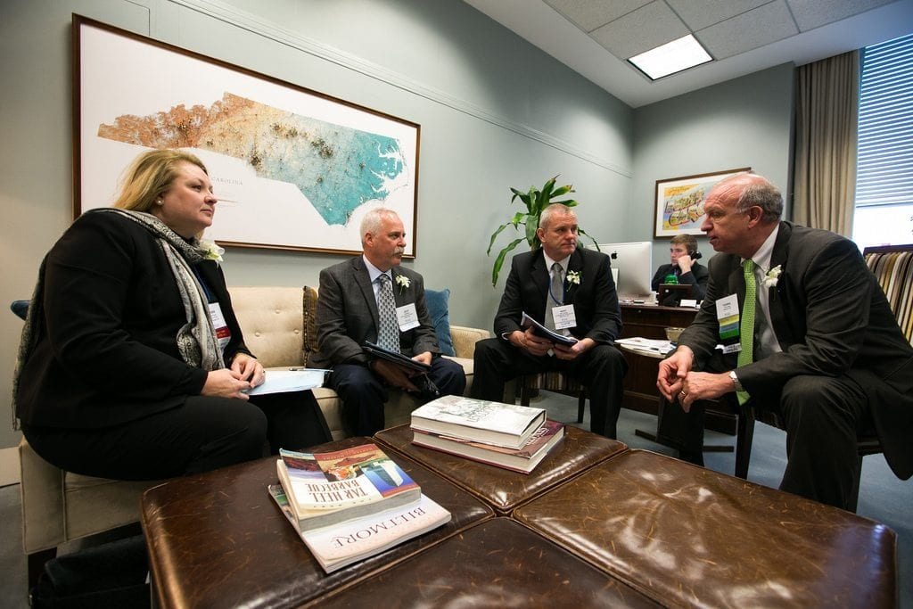 Bert Lemkes (center), general manager of Tri-Hishtil, talked to The Washington Post about his perspective on E-Verify. He and a group of floral industry members from North Carolina discussed the issues with lawmakers and staff at past Congressional Action Days.