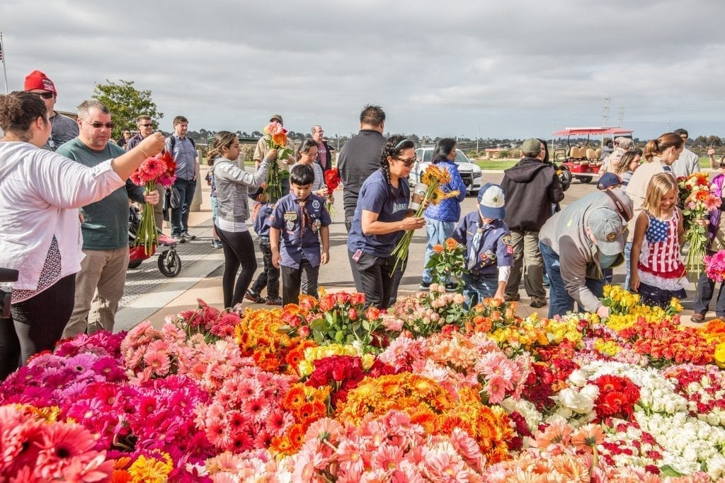 At Miramar National Cemetery in San Diego, 160 volunteers distributed 2,000 flowers.