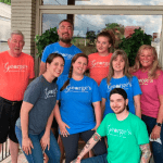 Super soft t-shirts with a catchy shop slogan have become bright, happy staff uniforms and “walking billboards” for George’s Flowers in Roanoke, Virginia.