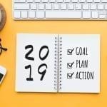2019 new year goal,plan,action text on notepad with office accessories.Business motivation,inspiration concepts