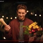 In the PetSmart commercial “Plan a Dog-Friendly Date Night” a teenage boy scores points by bringing his date flowers and a bone for her dog.